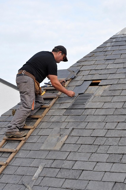 Man on a roof inspecting it